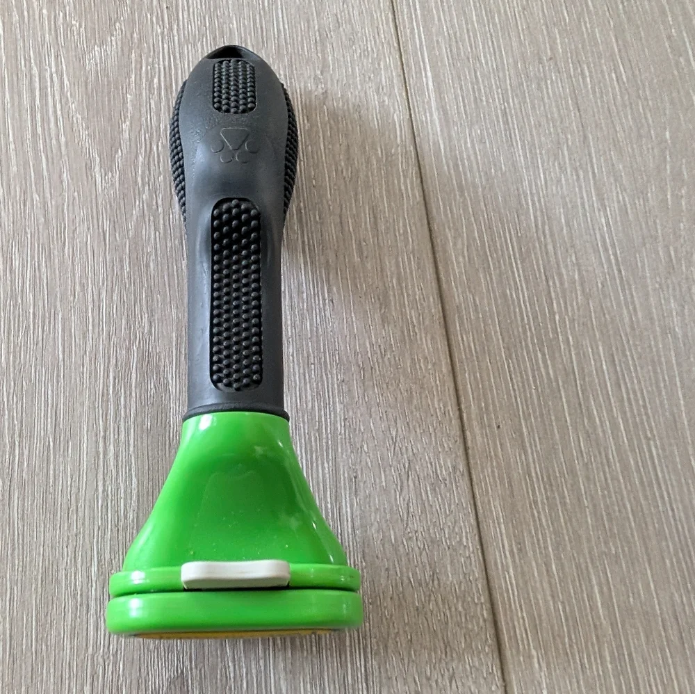 FURminator Black and Green Grooming Tool